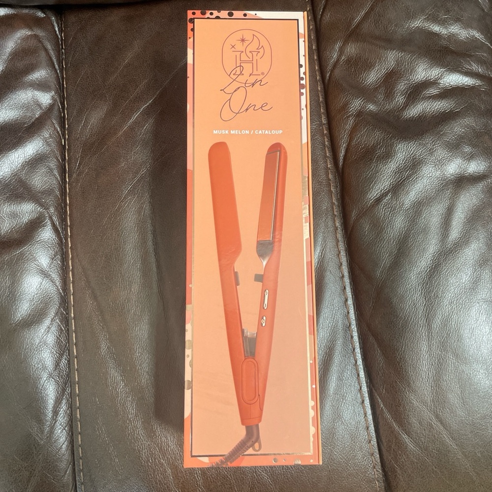 Hauteness 2 in 1 curling and straightening. Orange new in box